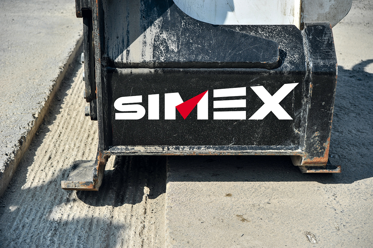 Simex PLB 350 Anbaufräse für Bagger im Einsatz auf Asphalt